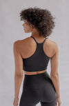 ethical sustainable Black longline halter sports bra girlfriend collective
