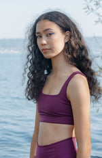 Ethical sustainable purple sports bra girlfriend collective